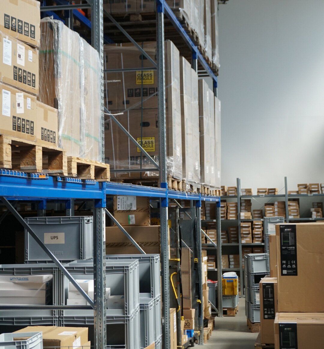 Shelves and boxes in the Welectron warehouse