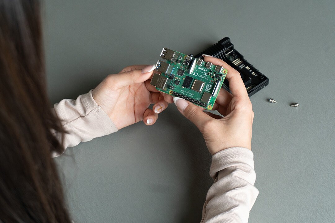 Raspberry Pi board in a hand
